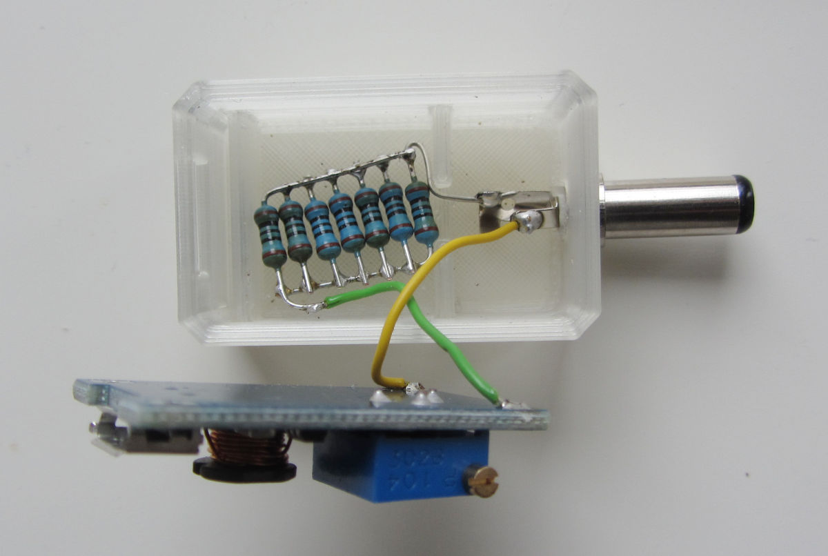 The USB powered H00AA? case with lid removed, showing the HW-183 boost DC/DC converter