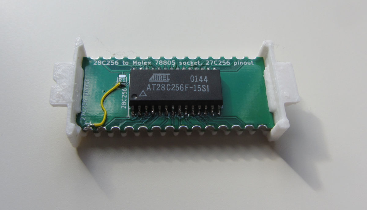 Atmel 28C256 SMD EEPROM on a adapter PCB for PX-4/PX-8 type cradles.
